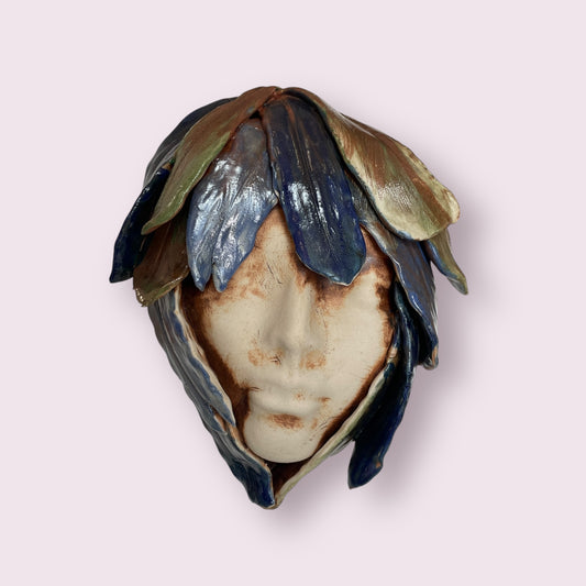 Feathered face - Robyn Smaller