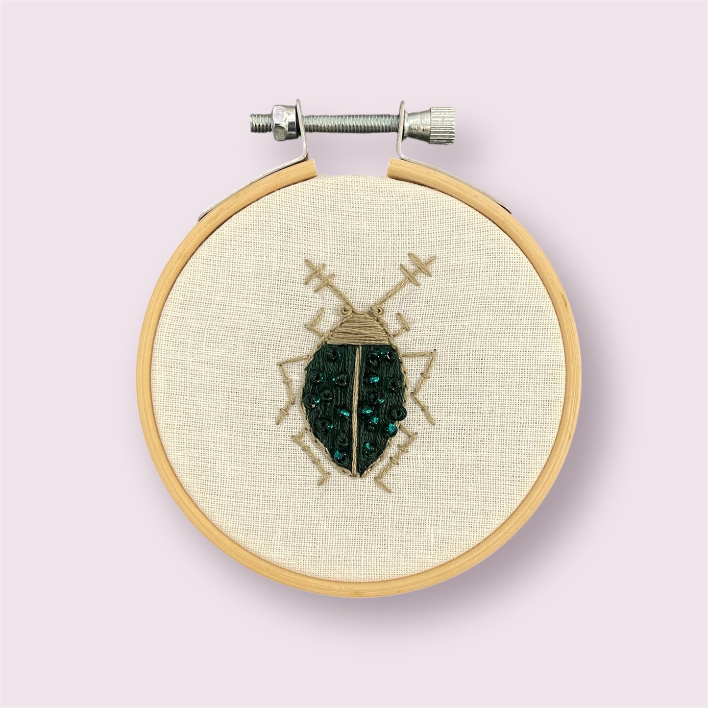 Dark green beetle - Jessica Taunt