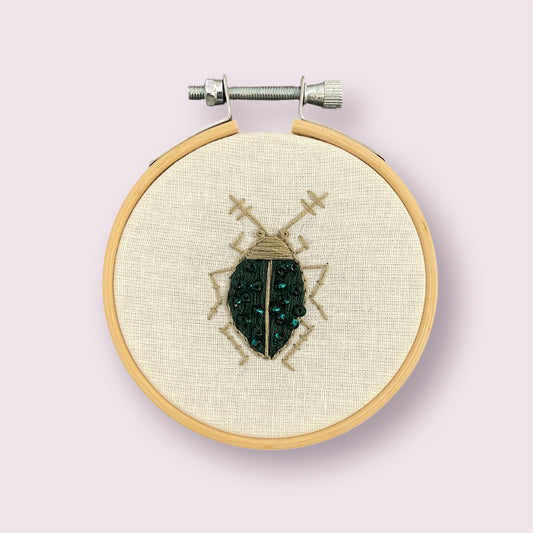 Dark green beetle - Jessica Taunt